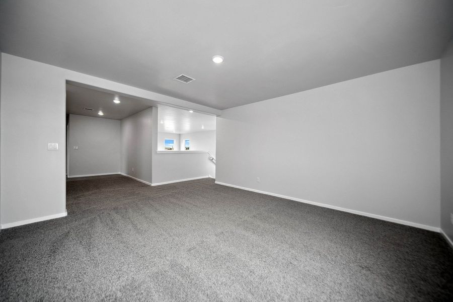 Representative unfurnished interior of a home built from the Capitan by Hakes Brothers in Summer Sky North, El Paso (Image 20).