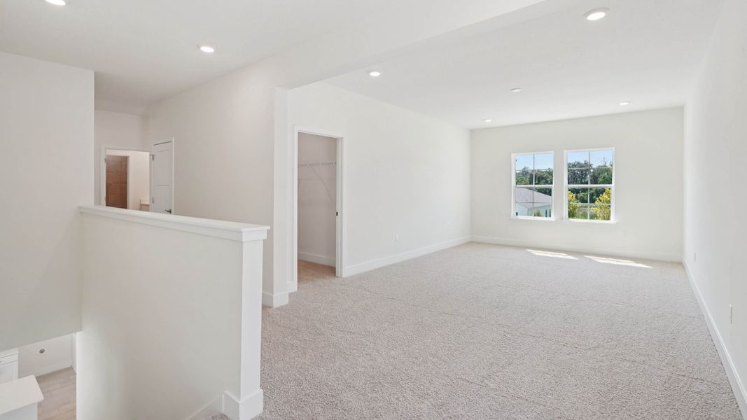 Representative unfurnished interior of a home built from the Hemingway by D.R. Horton in Sandal Key, Weeki Wachee (Image 23).