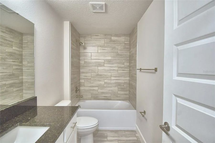 Furnished interior view inside a new home in Lake Juliana Estates, Auburndale (Image 9).
