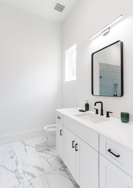 View of en-suite bath for 4th bedroom