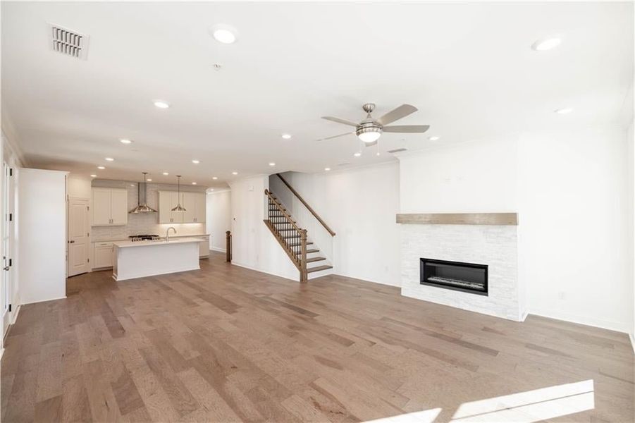 Welcome to Ecco Park and homesite 29 END UNIT with Beautiful Hard Surface Floors that flow throughout the main floor living spaces. HURRY $45k incentive! READY NOW!