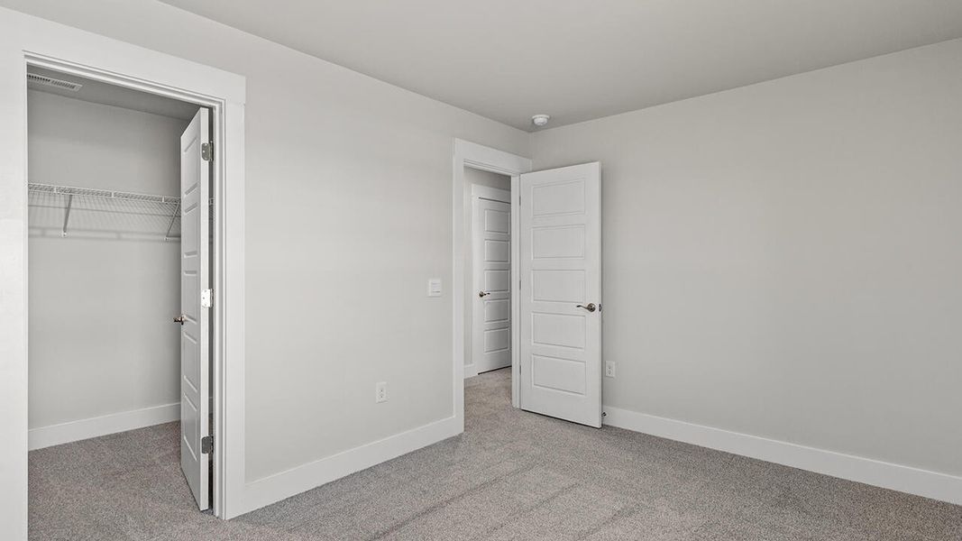 Spacious, unfurnished interior of a new home in Cedar Hill Landing, Navassa (Image 35).