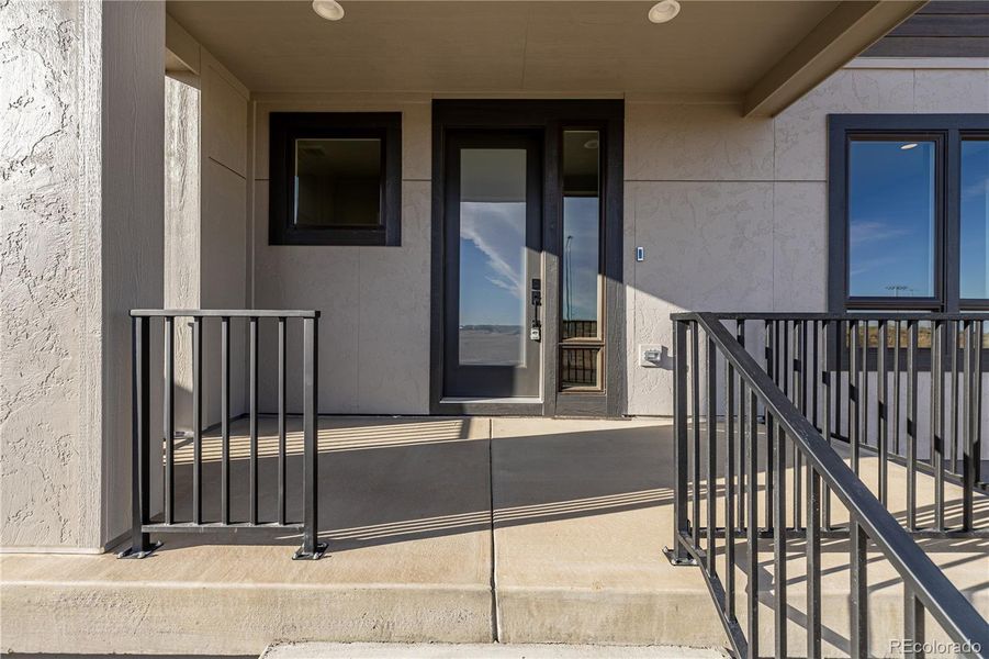 Exterior details and patio area of a home in West Grange, Longmont (Image 26).