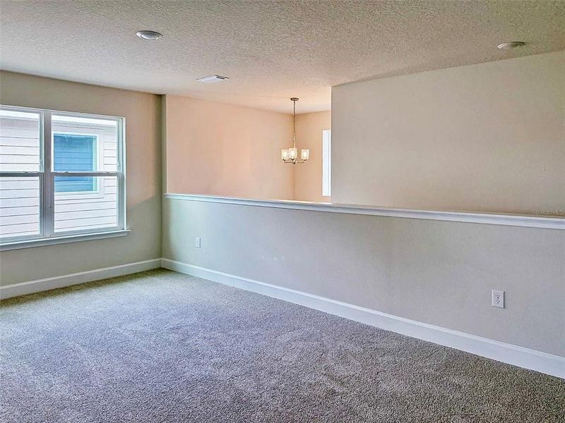 Spacious, unfurnished interior of a new home in Harmony Central, St. Cloud (Image 5).
