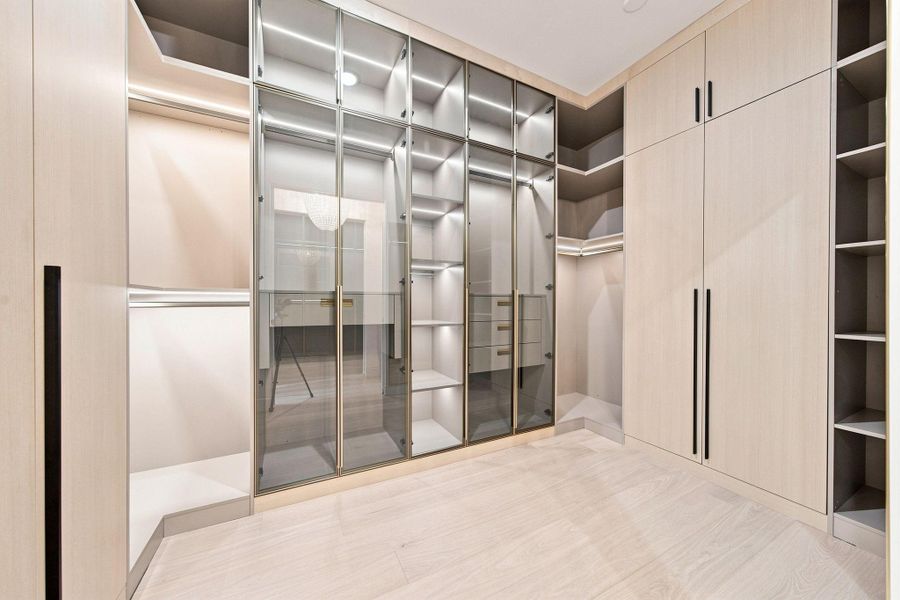 oversized walk-in closet, andrefined designer finishes.