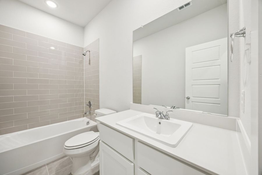 Bathroom in the Masters home plan by Trophy Signature Homes – REPRESENTATIVE PHOTO Bathroom in the Masters home plan by Trophy Signature Homes – REPRESENTATIVE PHOTO