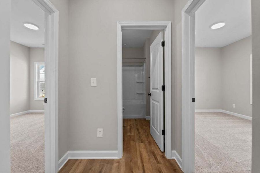 Representative unfurnished interior of a home built from the Weymouth by Caviness & Cates Communities in Bartlett Manor, Youngsville (Image 39).
