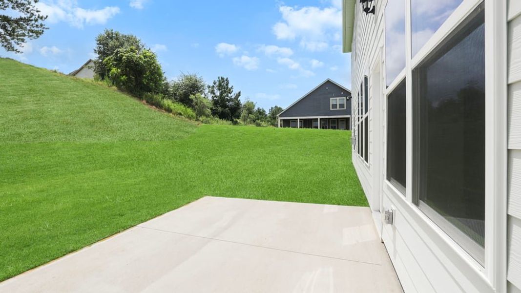 Exterior details and patio area of a home in Sunset Summits, Spartanburg (Image 16). Exterior details and patio area of a home in Sunset Summits, Spartanburg (Image 16).