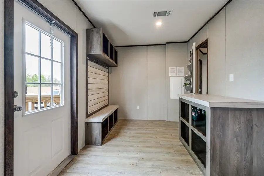 Mudroom featuring light wood-style floors Mudroom featuring light wood-style floors