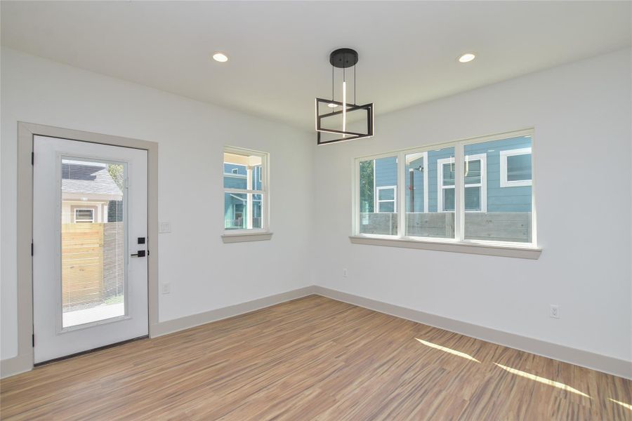 Dining area. Direct access to back porch & yard.