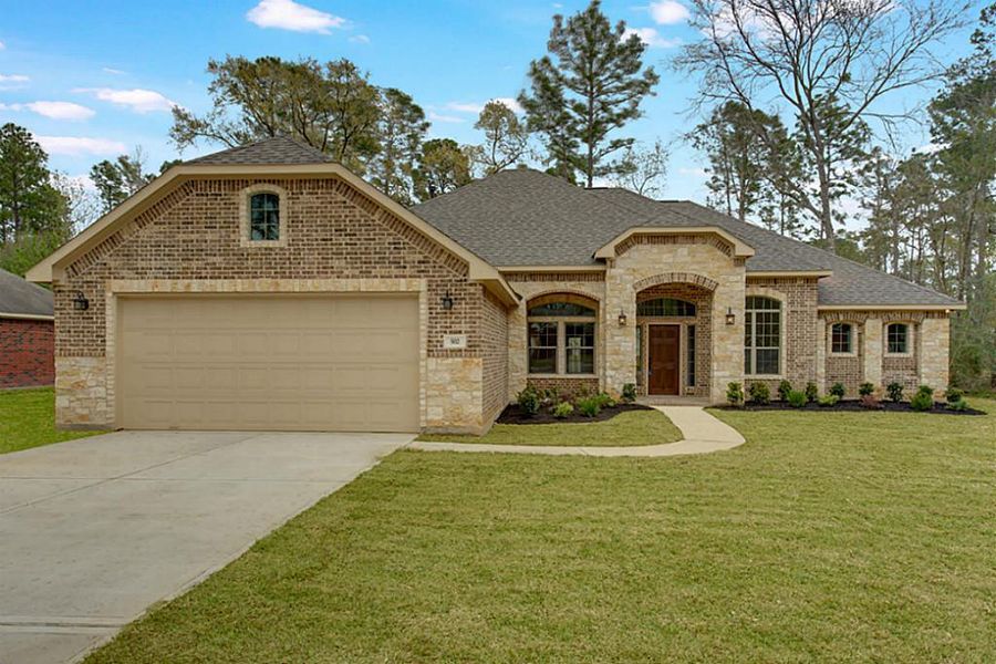 Home under construction. The photos are of other previously completed homes by this builder.  This home will have similar finishes.