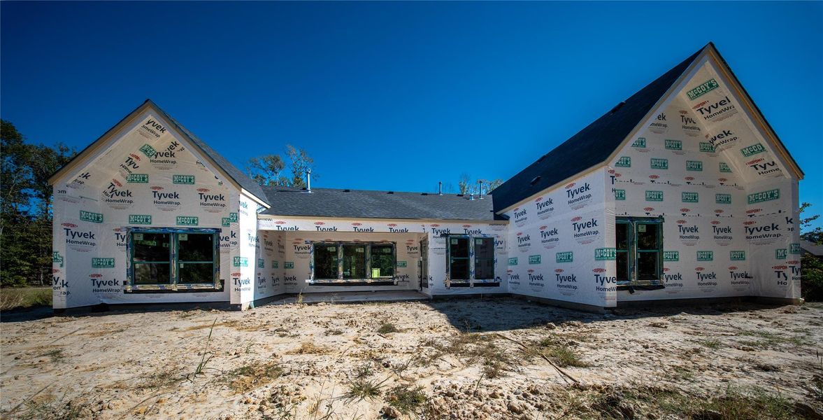 Exterior back elevation with covered patio Exterior back elevation with covered patio