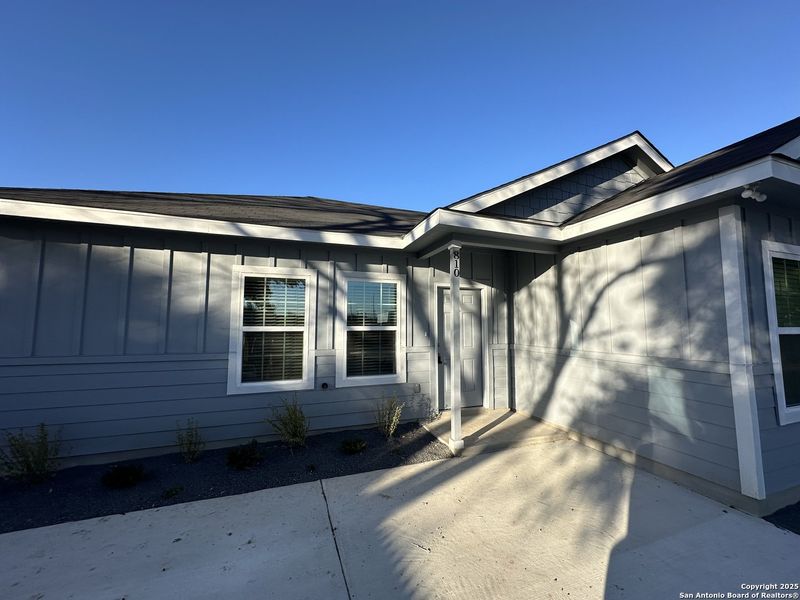 Front exterior of a new home in , Seguin, TX, highlighting curb appeal (Image 21). Front exterior of a new home in , Seguin, TX, highlighting curb appeal (Image 21).