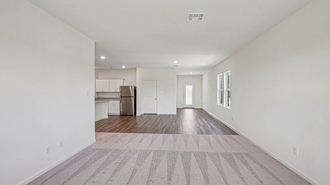 Representative unfurnished interior of a home built from the Pioneer by Starlight Homes in Avalon Ridge, Cut and Shoot (Image 18).