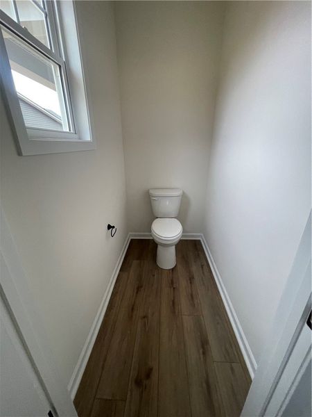 Spacious, unfurnished interior of a new home in Springwood Grove, Central (Image 30).