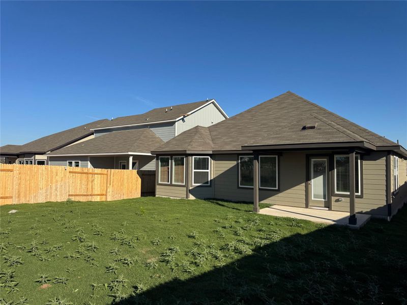 Exterior details and patio area of a home in Riverbend at Double Eagle - Boulevard Collection, Cedar Creek (Image 2). Exterior details and patio area of a home in Riverbend at Double Eagle - Boulevard Collection, Cedar Creek (Image 2).