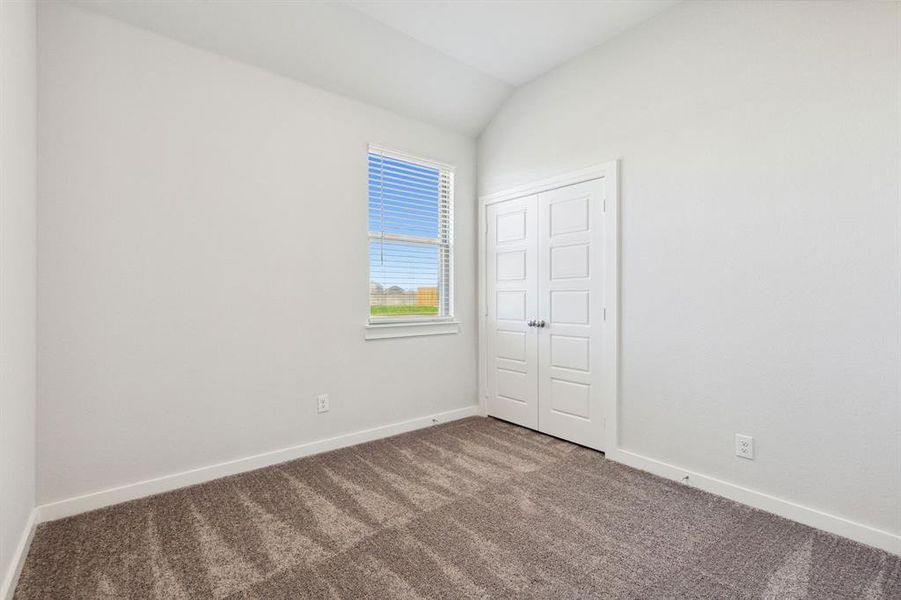 Bedroom in the Ash home plan by Trophy Signature Homes – REPRESENTATIVE PHOTO