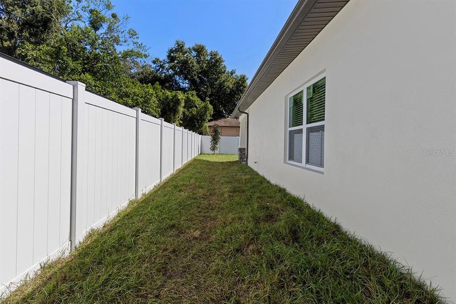 Exterior details and patio area of a home in , Tampa (Image 32).