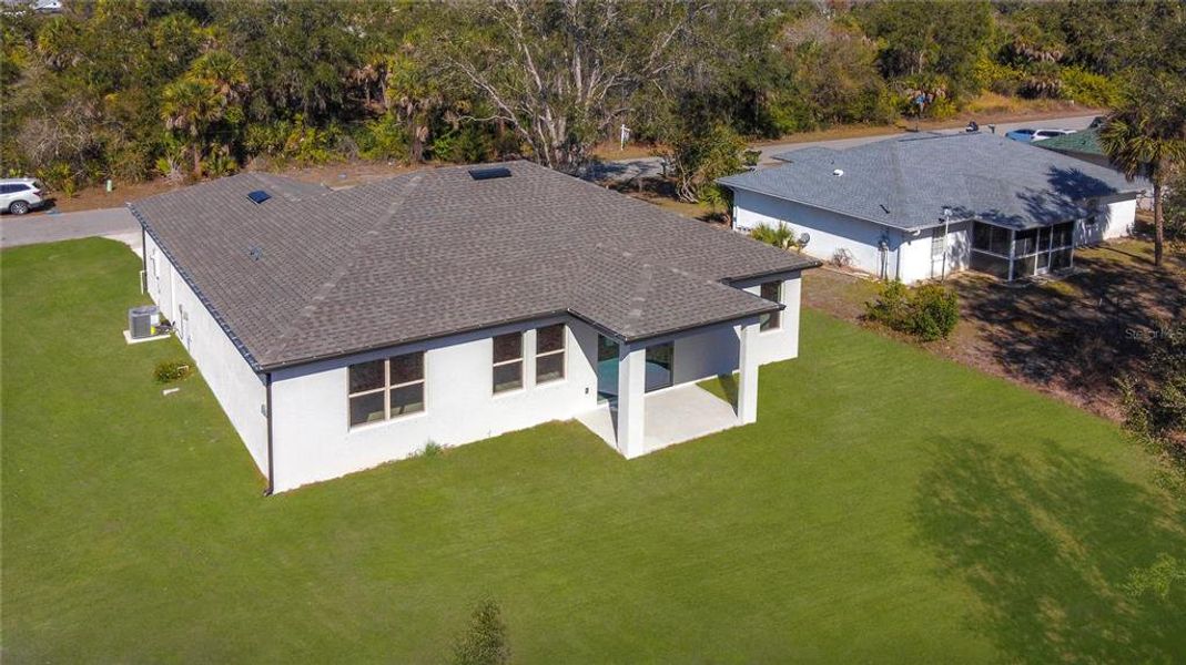 Exterior details and patio area of a home in , North Port (Image 27).