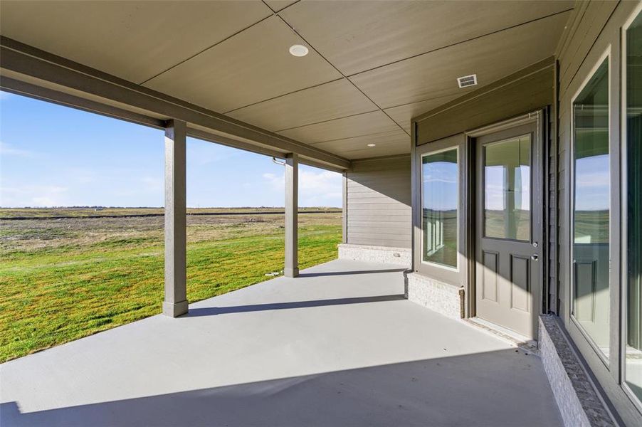 Exterior details and patio area of a home in Clear Sky Addition, Valley View (Image 15).