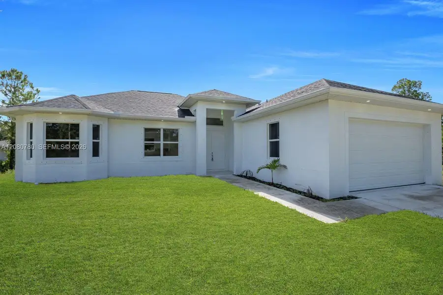 Exterior details and patio area of a home in , Lehigh Acres (Image 3). Exterior details and patio area of a home in , Lehigh Acres (Image 3).