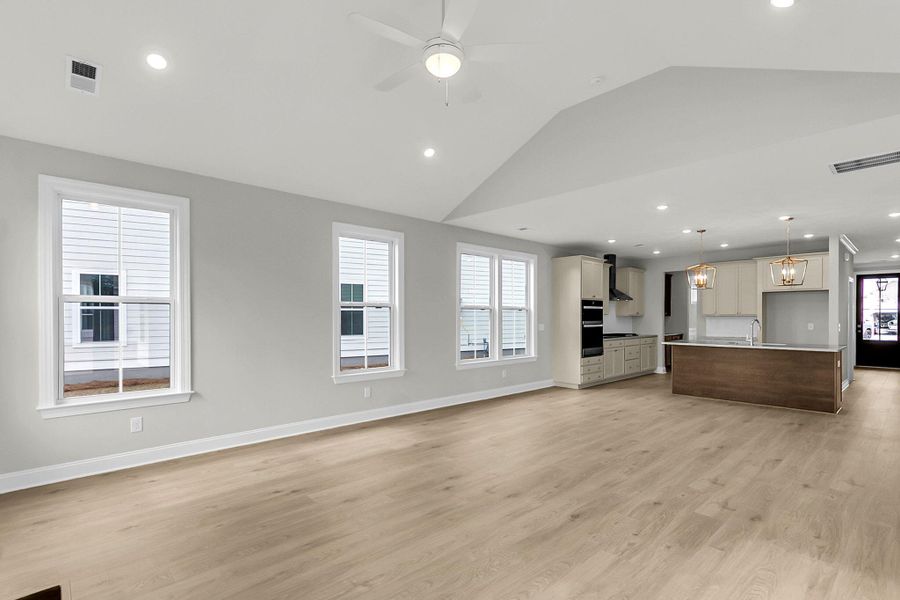 Spacious, unfurnished interior of a new home in Tidewater at Lakes of Cane Bay, Summerville (Image 25).