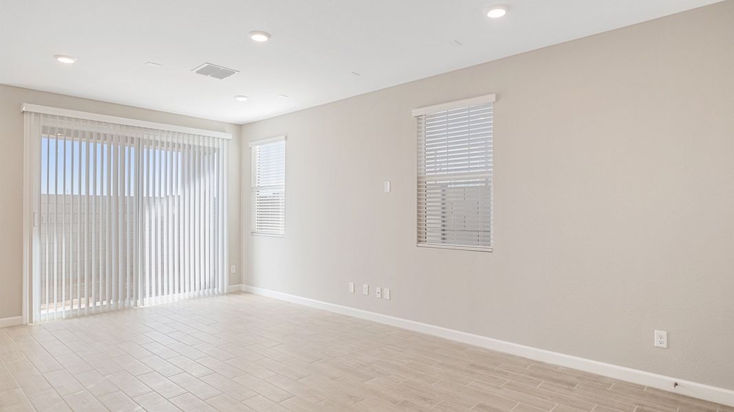 Spacious, unfurnished interior of a new home in Talinn Towns at Desert Ridge, Phoenix (Image 13).