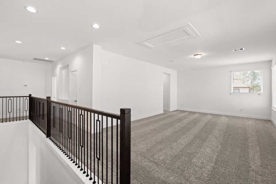 Spacious, unfurnished interior of a new home in The Highlands, Porter (Image 33).