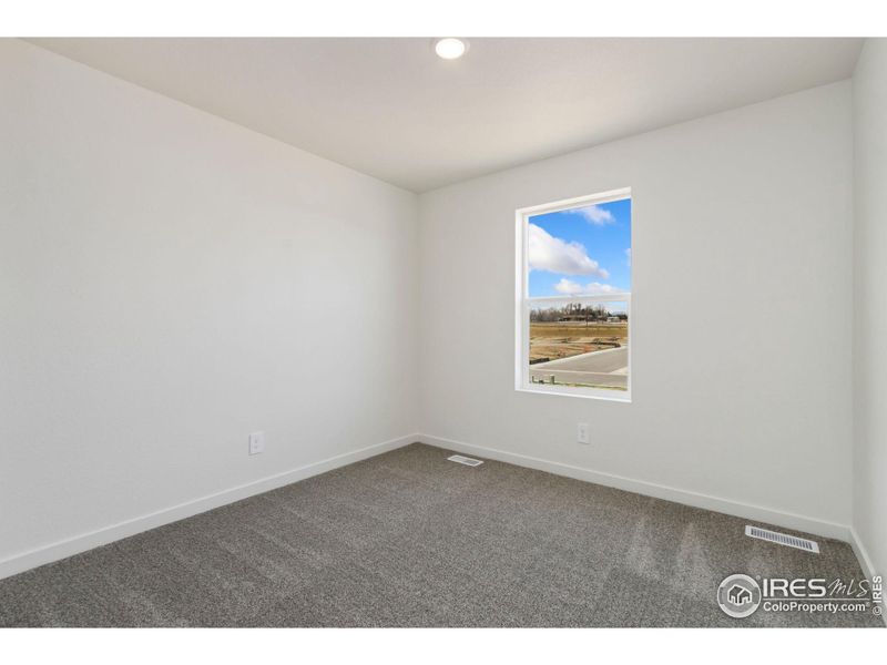 Spacious, unfurnished interior of a new home in Sage Meadows, Wellington (Image 12).