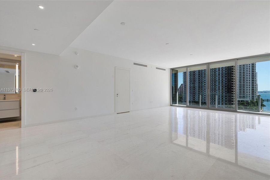 Spacious, unfurnished interior of a new home in Aston Martin Residences, Miami (Image 22).