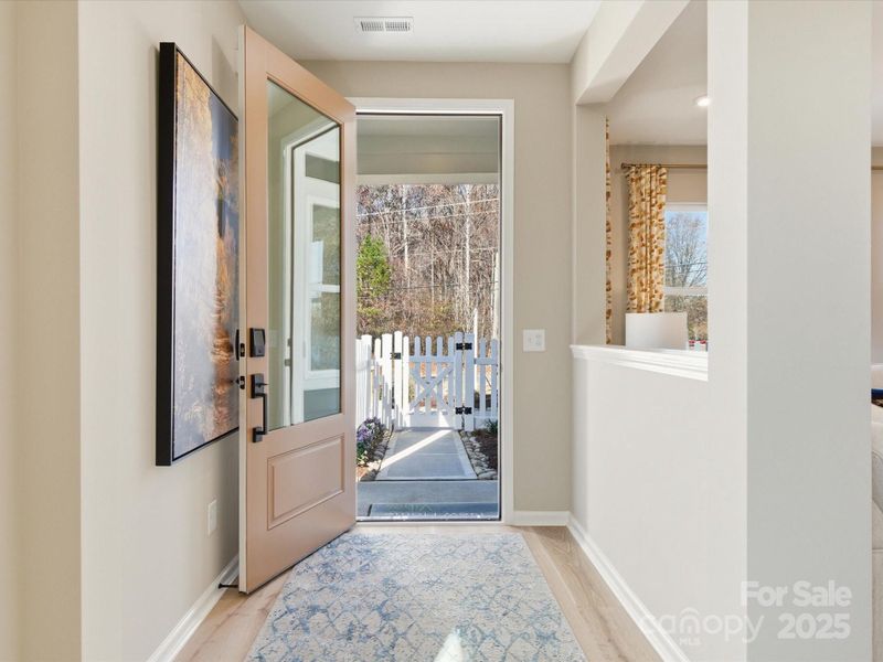 Grand Front Entry Through 8' Doorway. *Model Photos | Actual Finishes, Structural Selections, and Orientation May Vary.