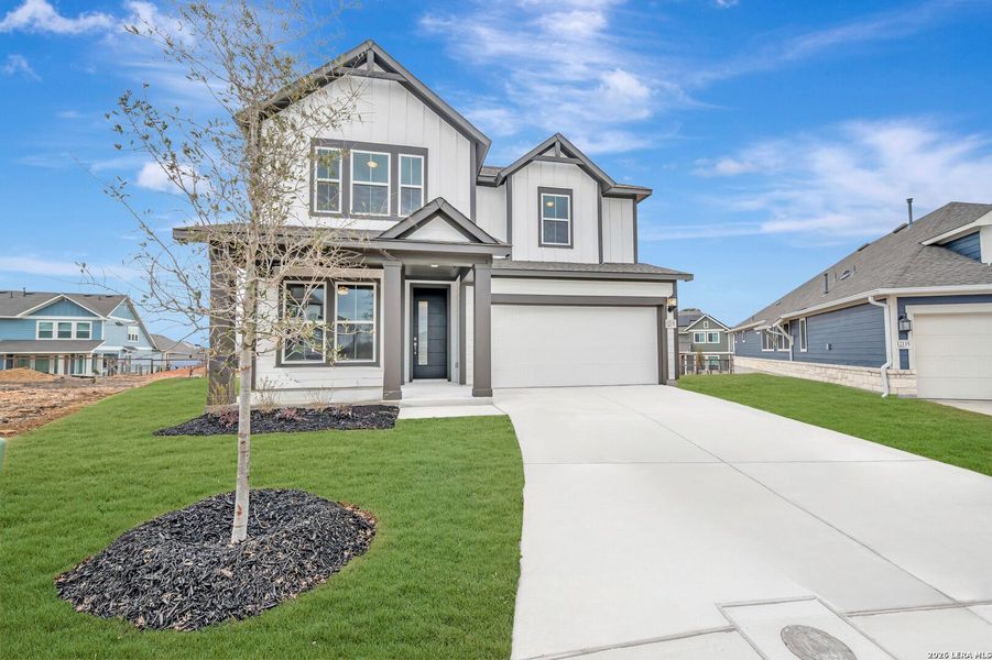 Front exterior of a new home in The Crossvine 45’, Schertz, TX, highlighting curb appeal (Image 25).
