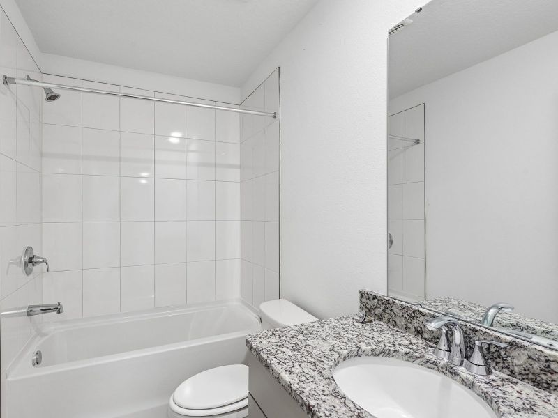 Furnished interior view inside a new home in The District at Oakleaf - The Grove, Middleburg (Image 5).