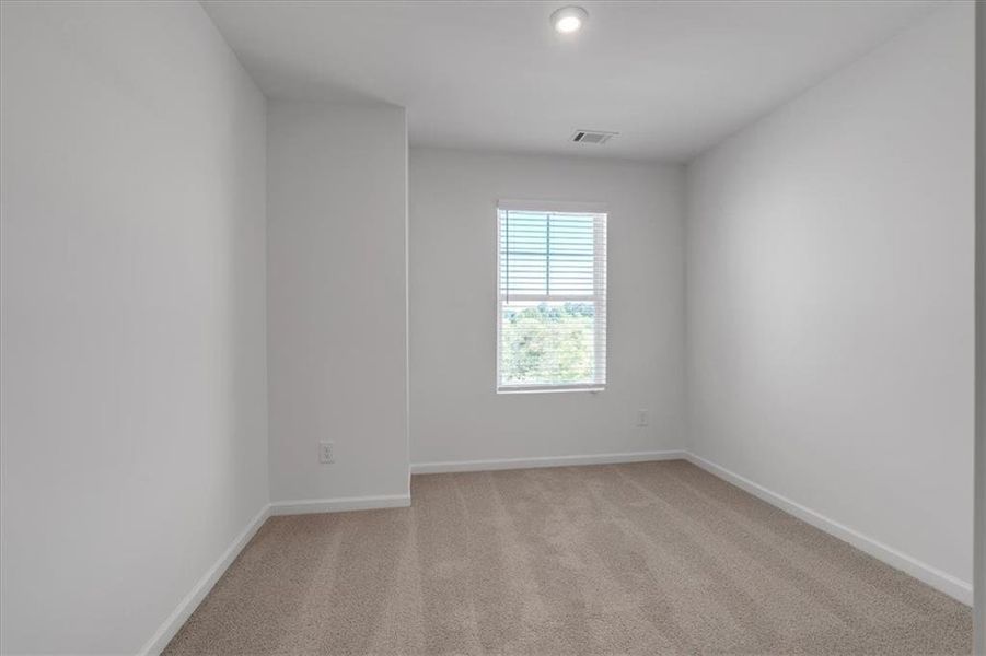 Spacious, unfurnished interior of a new home in The View at Groover's Lake, Lithia Springs (Image 13).