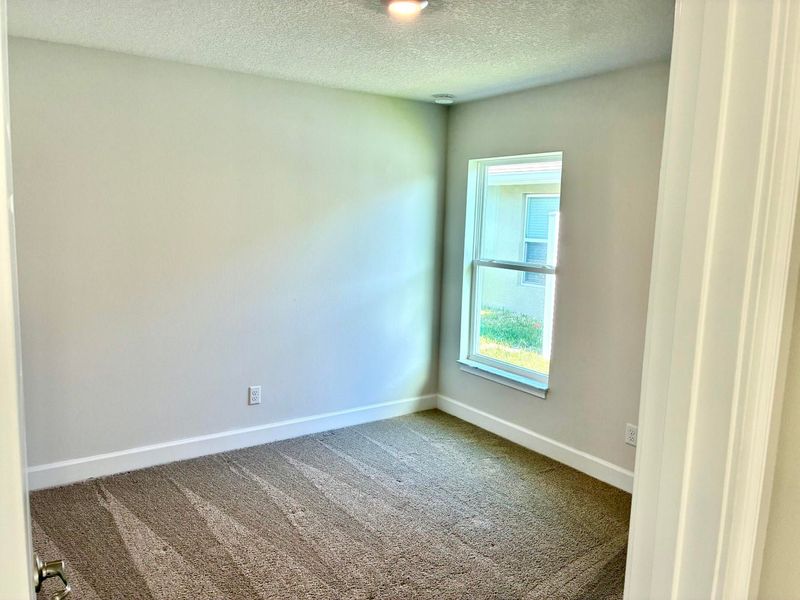 Spacious, unfurnished interior of a new home in Waterstone 72, Fort Pierce (Image 14).