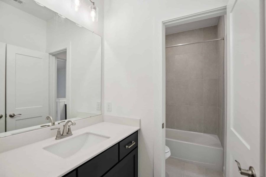 Furnished interior view inside a new home in The Trails, New Caney (Image 15).