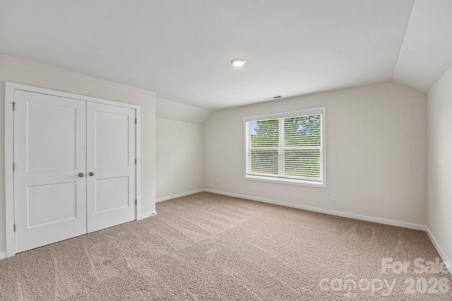 Spacious, unfurnished interior of a new home in Sanctuary at Southgate, Indian Trail (Image 31).