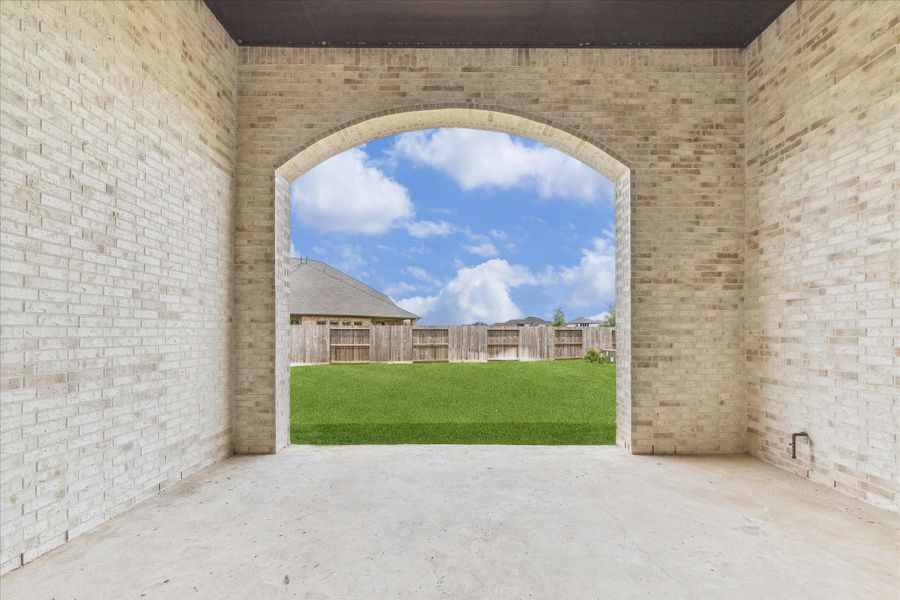The covered patio has a curved arch, gas stub piping and totally bricked. The covered patio has a curved arch, gas stub piping and totally bricked.