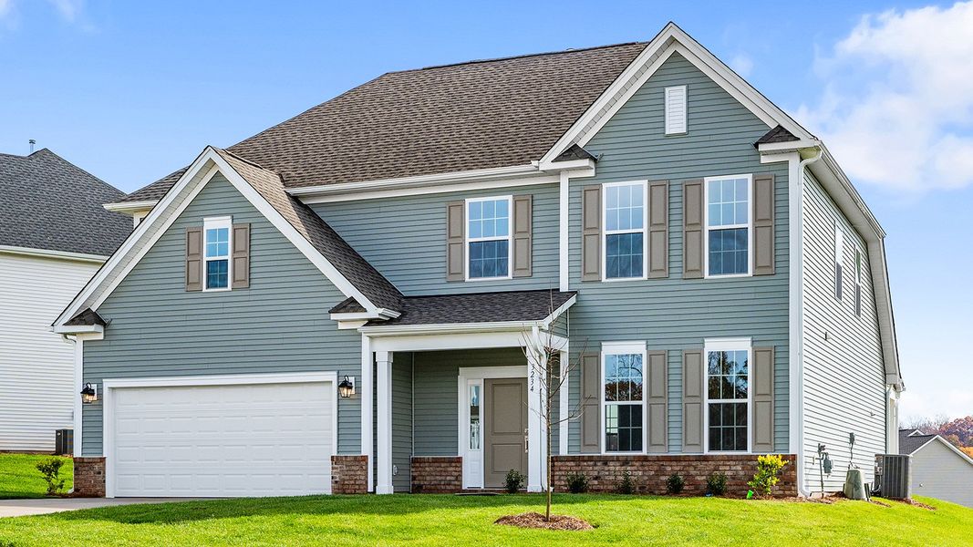 Front exterior of a new home in Hanes Lake, Winston-Salem, NC, highlighting curb appeal (Image 2).