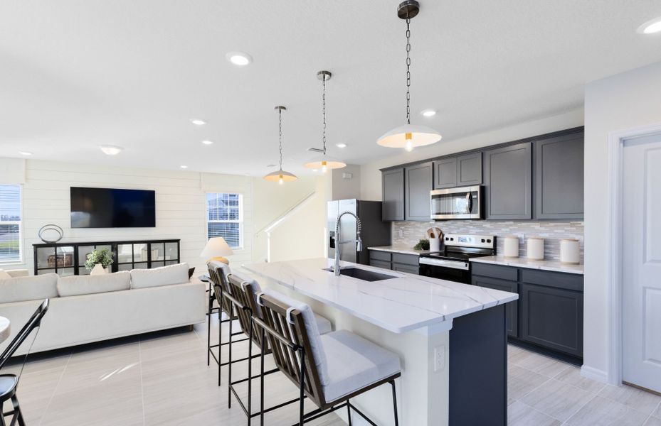 Representative furnished interior of a home built from the Mabel II by Pulte Homes in EverBe, Orlando (Image 16).