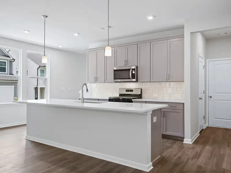 Representative furnished interior of a home built from the Cary A by Davidson Homes LLC in Lake Shore, Winder (Image 10).