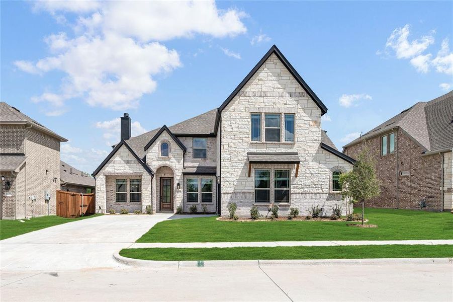 Front exterior of a new home in Liberty, Melissa, TX, highlighting curb appeal (Image 2).