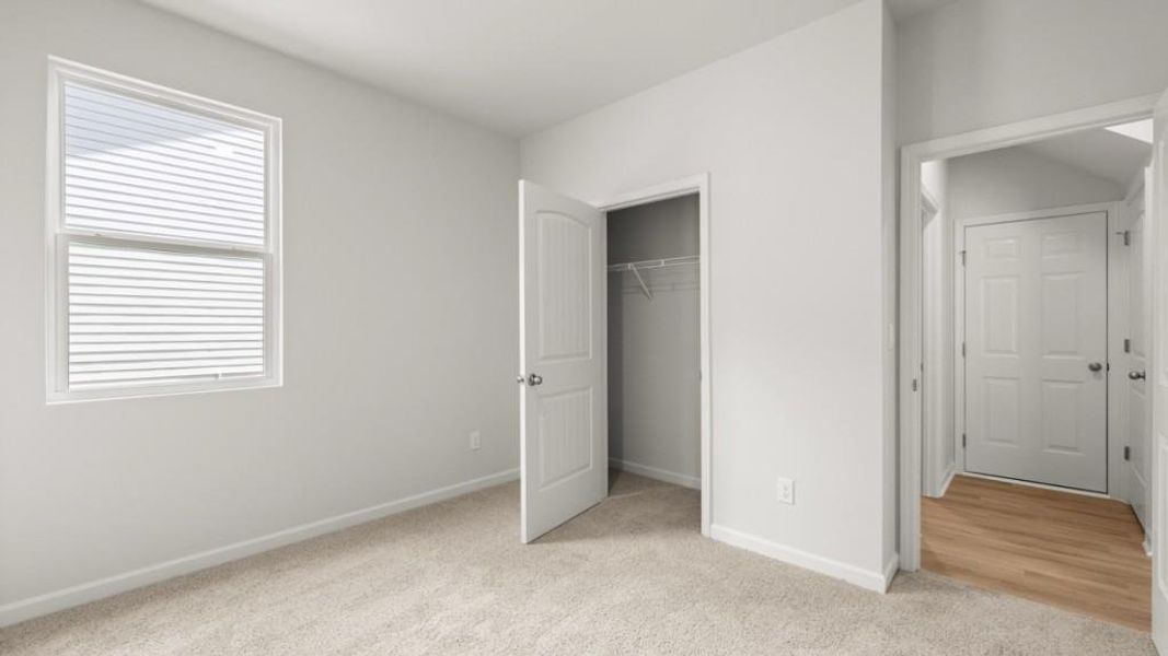 Spacious, unfurnished interior of a new home in Northwoods at Mirror Lake, Villa Rica (Image 36).