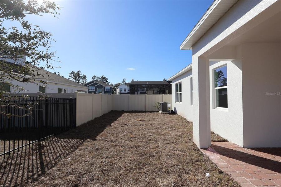 Exterior details and patio area of a home in Eden at Crossprairie, St. Cloud (Image 7).