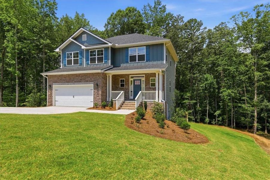 Front exterior of a new home in Tuscany Hills, Douglasville, GA, highlighting curb appeal (Image 20). Front exterior of a new home in Tuscany Hills, Douglasville, GA, highlighting curb appeal (Image 20).