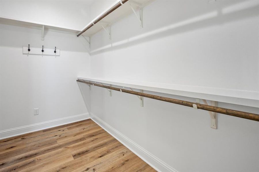 Large walk in closet in primary bedroom