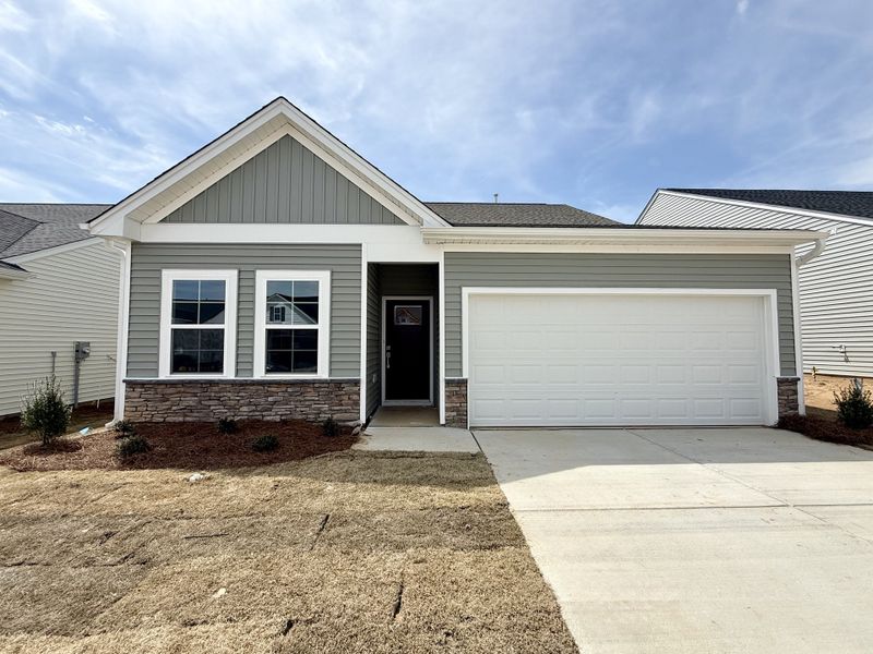 Front exterior of a new home in Fieldstone, Lexington, NC, highlighting curb appeal (Image 1). Front exterior of a new home in Fieldstone, Lexington, NC, highlighting curb appeal (Image 1).