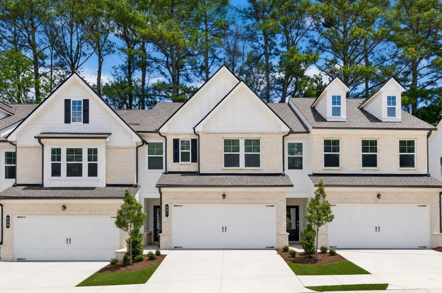 Front exterior of a new home in Rainwater Park, Lawrenceville, GA, highlighting curb appeal (Image 1). Front exterior of a new home in Rainwater Park, Lawrenceville, GA, highlighting curb appeal (Image 1).