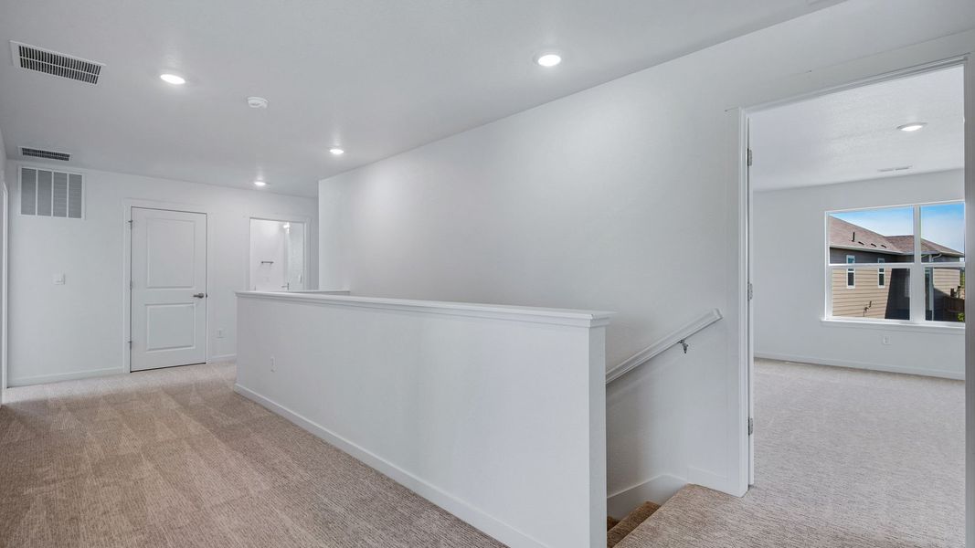 Spacious, unfurnished interior of a new home in Trails at Crowfoot, Parker (Image 35).