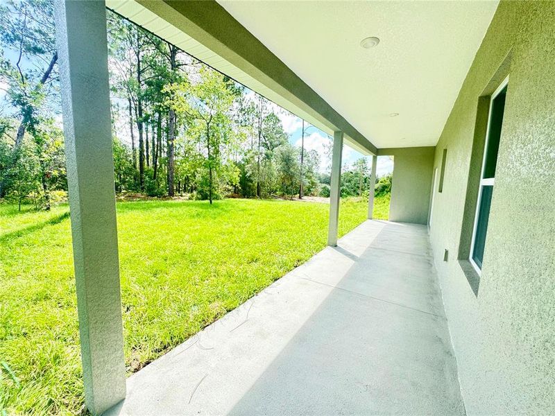 Exterior details and patio area of a home in , Citrus Springs (Image 24).